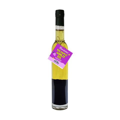 Bottle of Benissimo Balsamic Garlic Oil on a white background