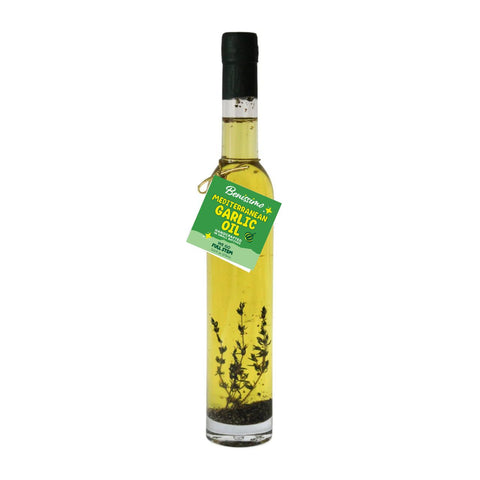 Bottle of Benissimo Mediterranean Garlic Oil on a white background