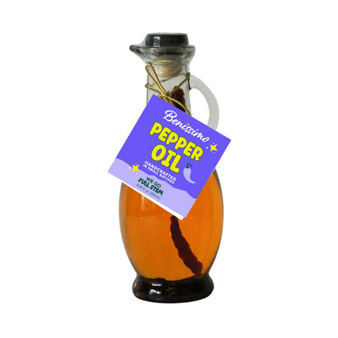 Bottle of Benissimo Pepper Oil on a white background